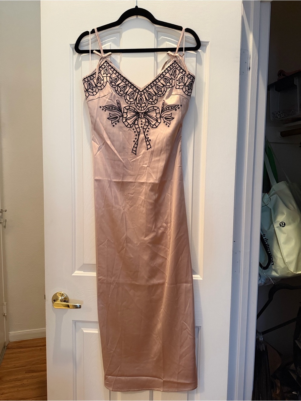 Blush Pink Midi Slip Dress with Black Embroidered Bow Accent